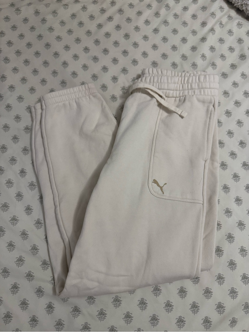 Puma Kids Off-White Sweatpants with Gold Logo